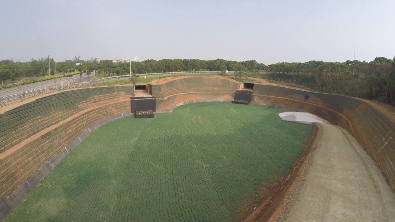 Aerial view of a lined containment cell under construction