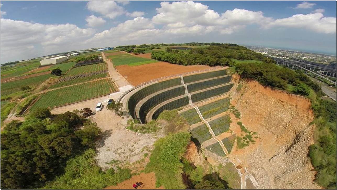 Reinforced slope and shoreline protection works
